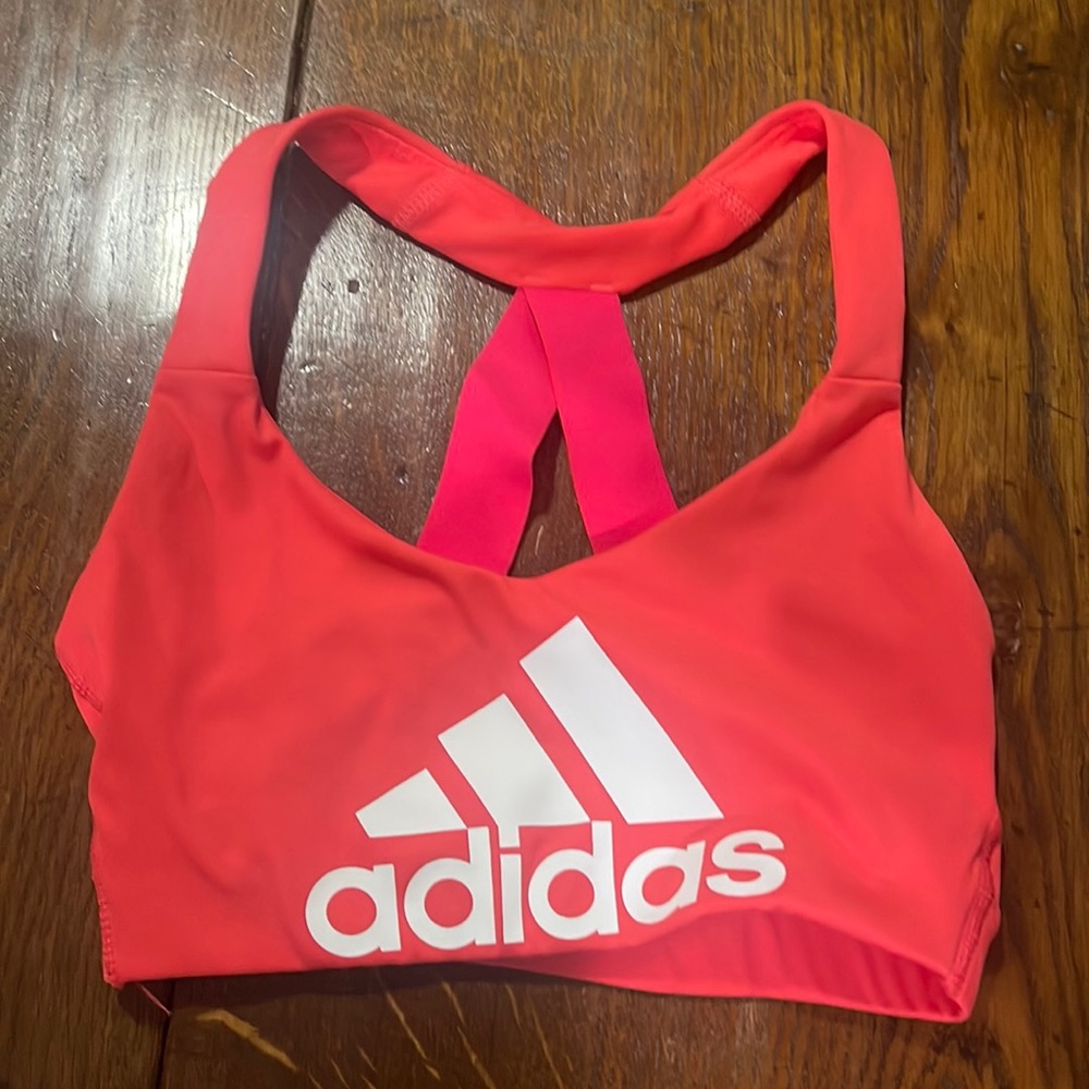 New without tags, adidas sports bra. Bright coral xs